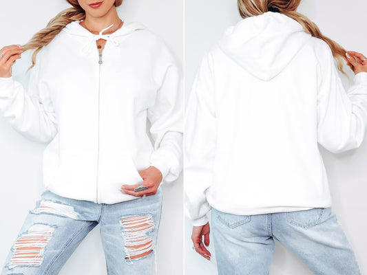 White zip-up hoodie featuring the words Expect Miracles in elegant script on the back. The design stands out as a bold yet peaceful reminder to believe in the impossible.